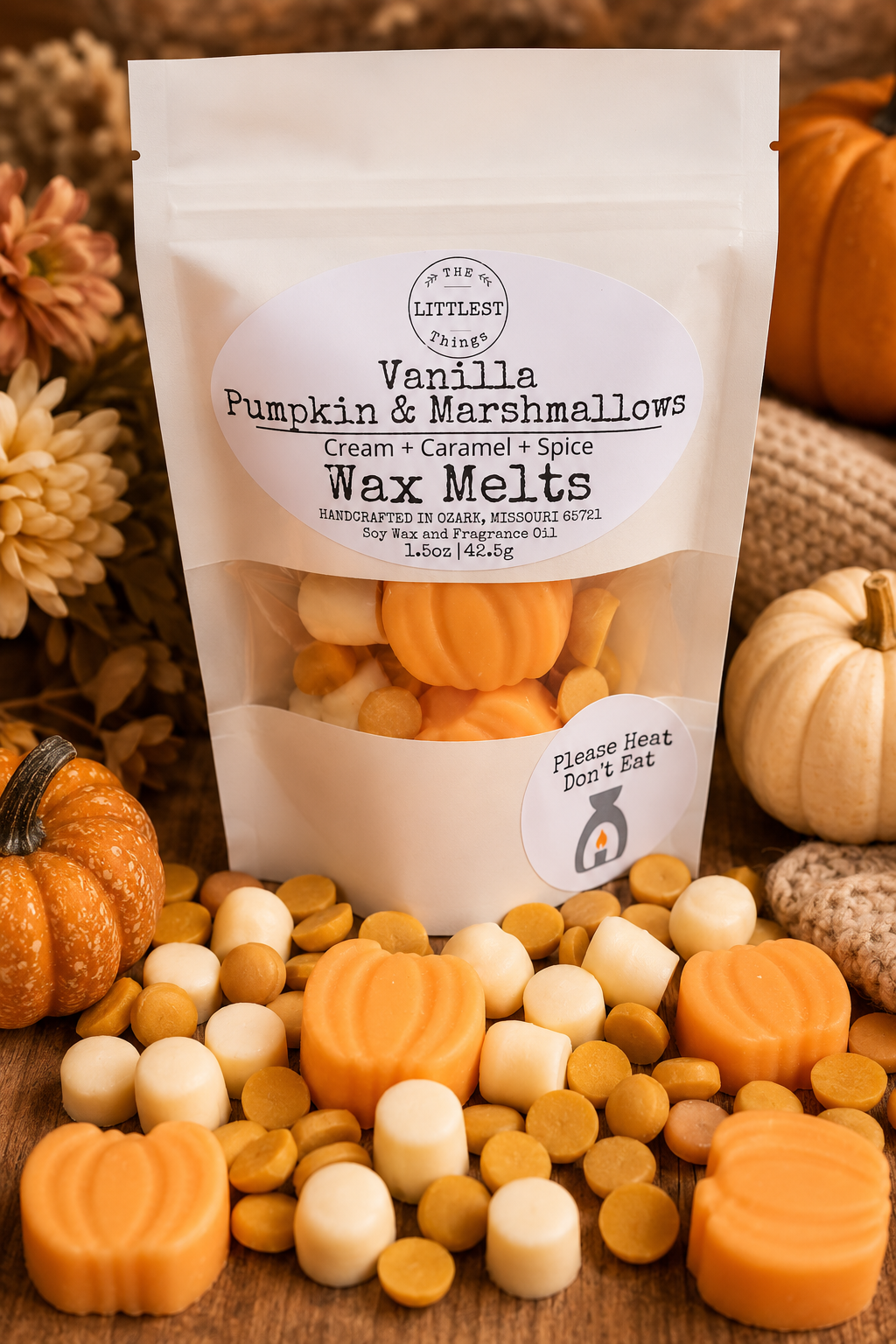 Packaging of Vanilla Pumpkin & Marshmallows Wax Melts with wax melts displayed in front on a wooden surface.